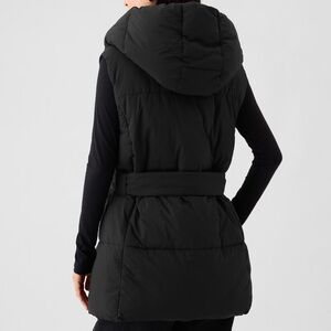 Black puffer vest with belt